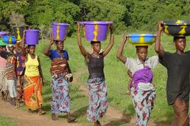 Women carry water